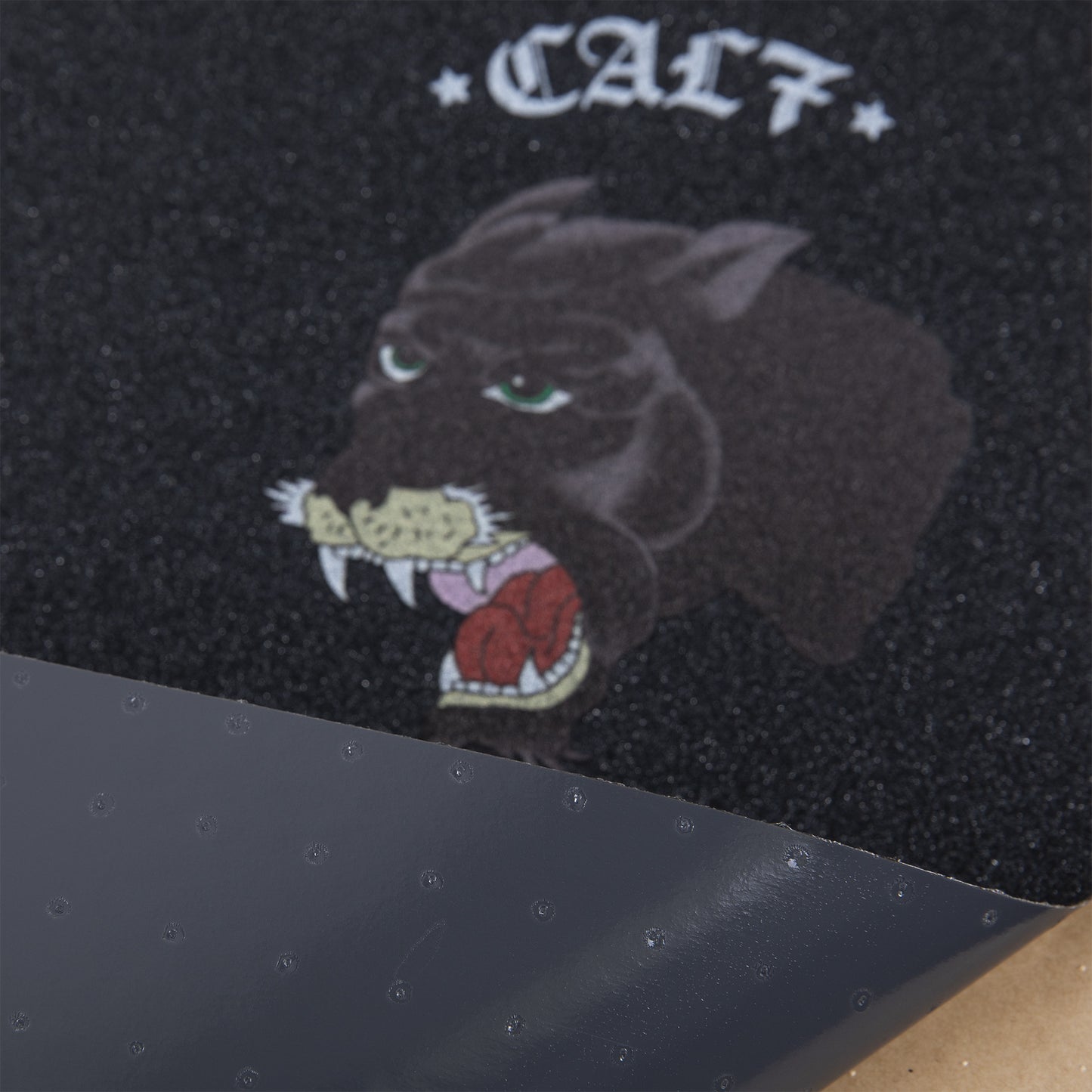 Cal 7 black skateboard griptape with panther design
