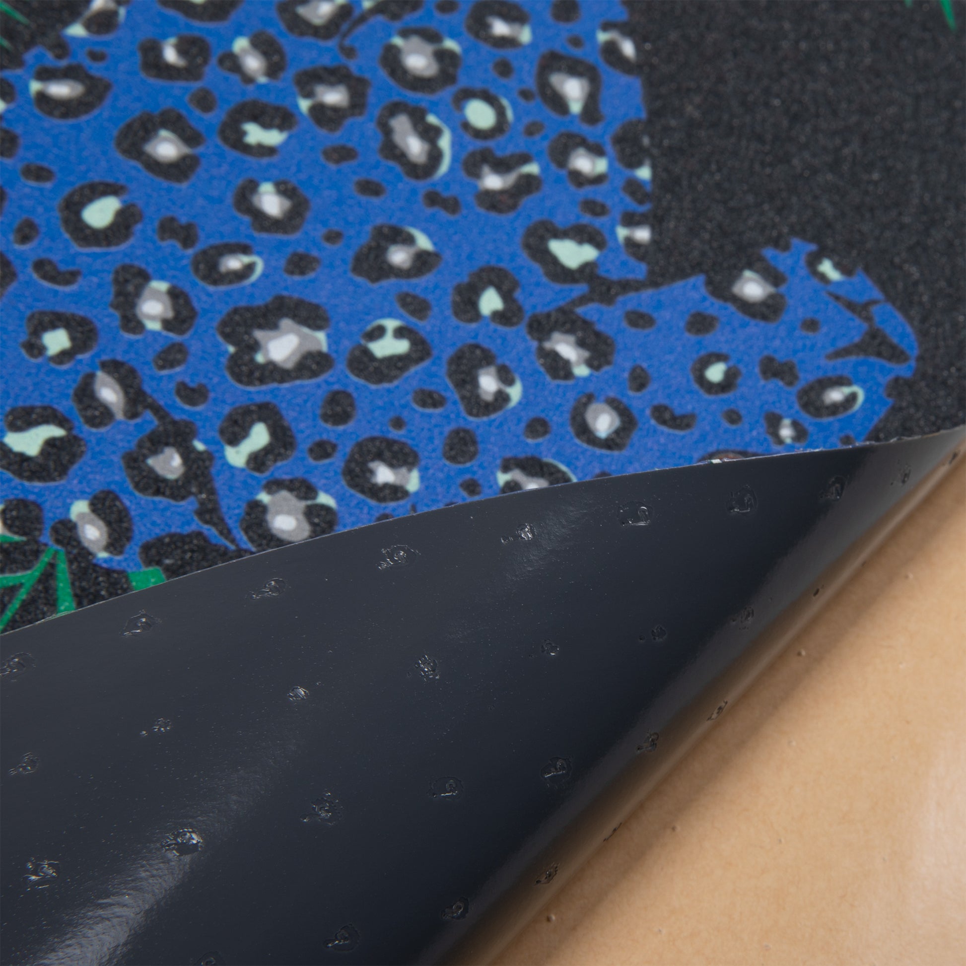 Cal 7 black skateboard griptape with Leopard design