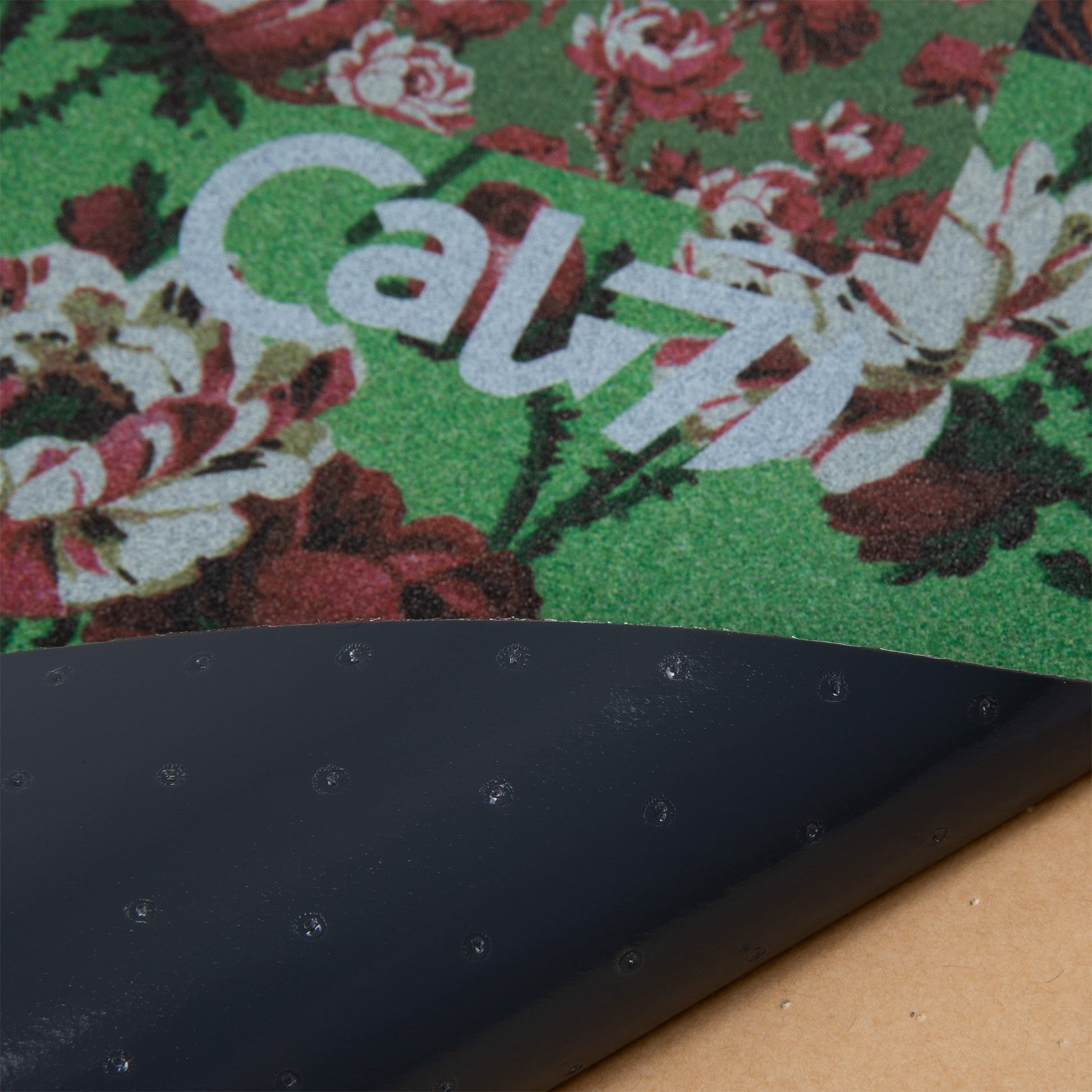 Cal 7 black skateboard griptape with flower design