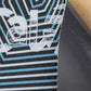 Cal 7 skateboard griptape with blue and white striped design